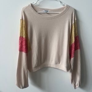 Sweater with pattern sleeves